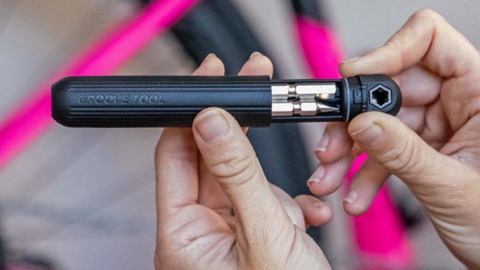 Ryder Innovation Groove Tool – Review The Ryder Innovation Groove Tool held in both hands.