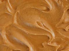 Woollies vs Yum Yum: who makes the best caramel peanut butter? A beautiful close-up of peanut butter