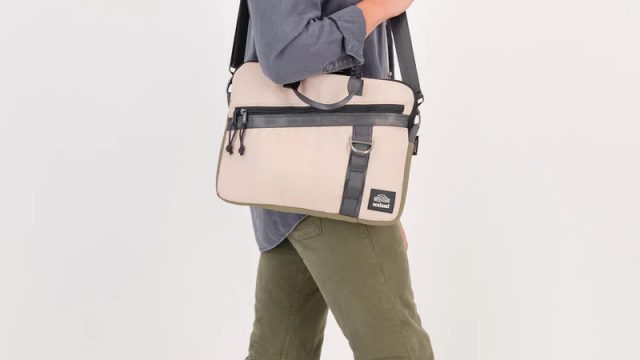 The Sealand Upcycled Slim Laptop Bag over the shoulder