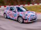 Next MINI Cooper could have a 400 km range The 2024 electric Mini Cooper, in pink camo, going round the track.